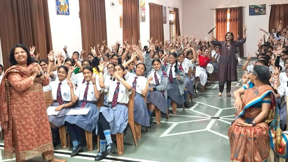 Dr. Sumita Prabhakar interacting with students during an adolescent health awareness session at St. Joseph's Academy, Dehradun.