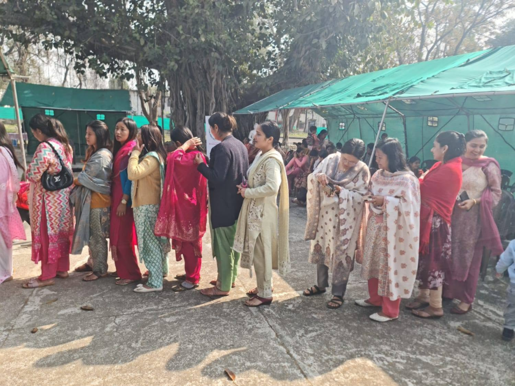 Women attending a breast and cervical cancer screening camp as part of the International Women's Day health initiative.